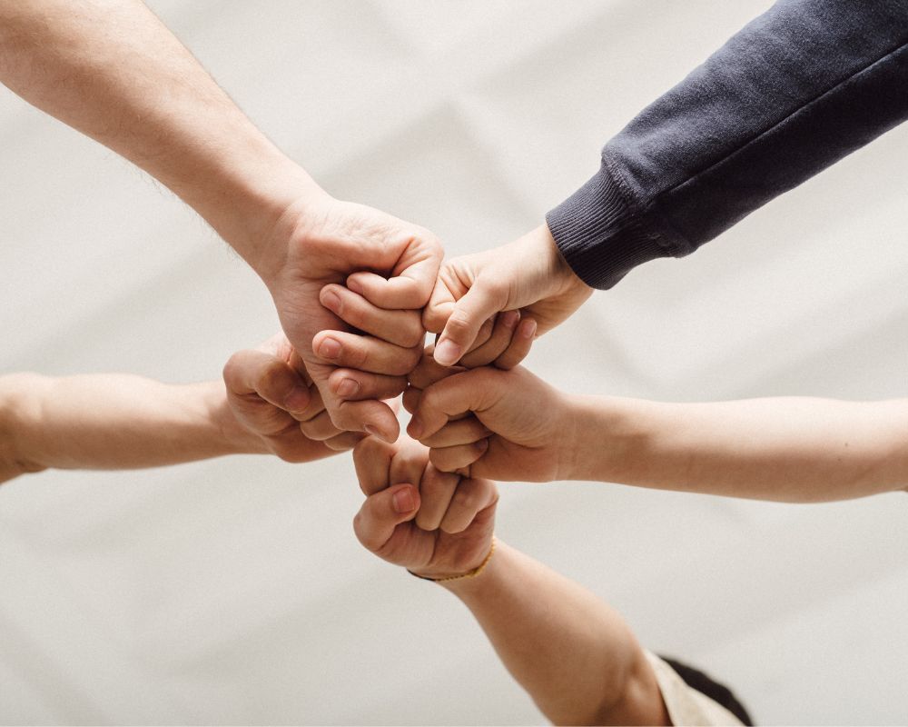 Group fist bump Group fist bump